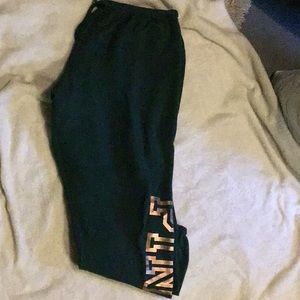 Dark Green jogger pink sweatpants.